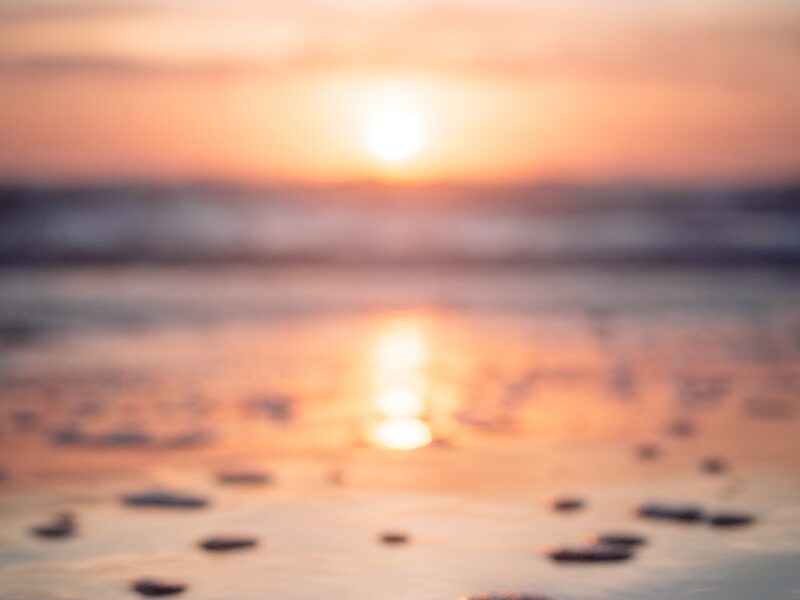 reflection of sunset on beachshore